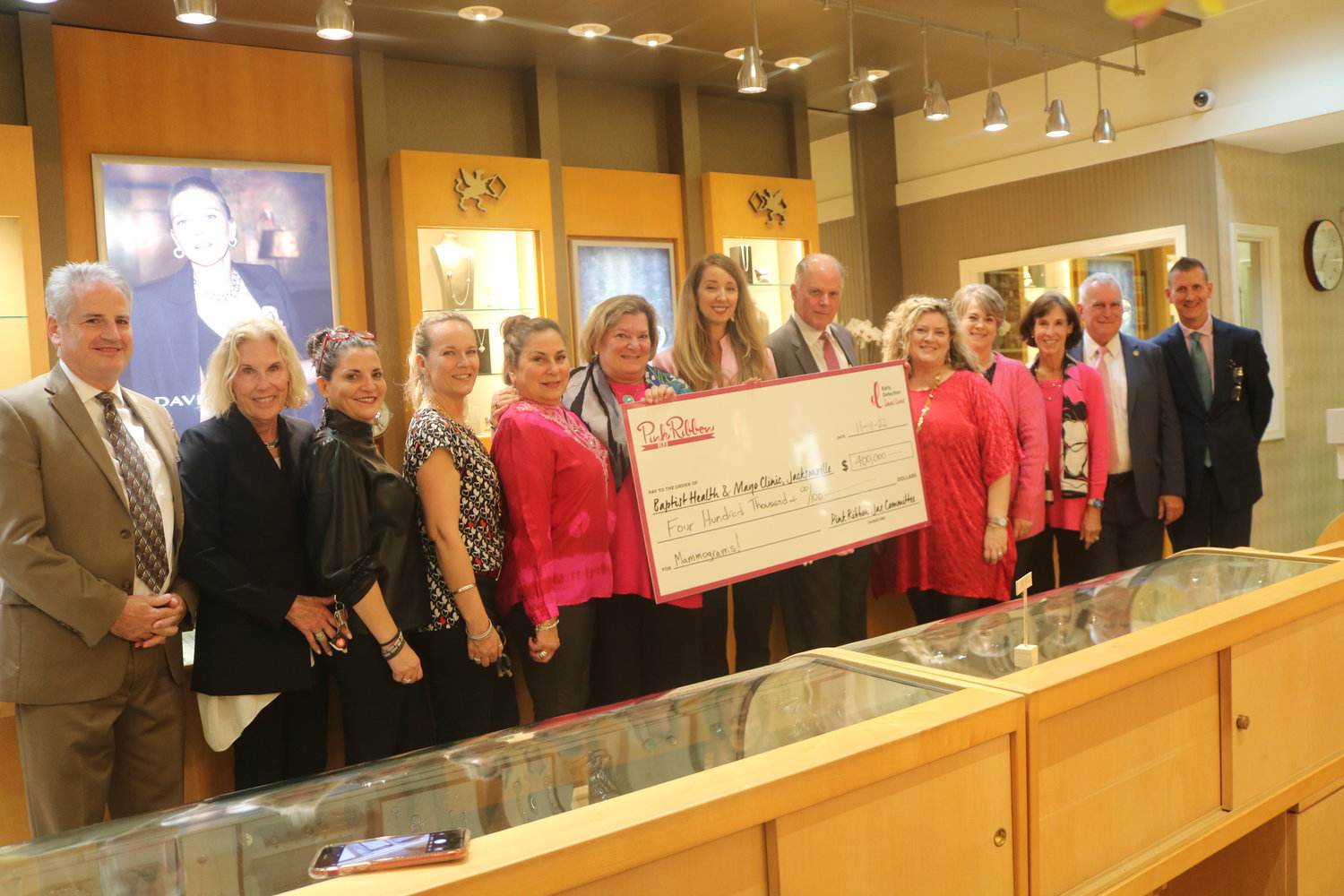 Pink Ribbon Jax presented a donation of $400,000 donation to Baptist Health and Mayo Clinic in Jacksonville for mammograms during a special event at Underwood Jewelers Nov. 9.